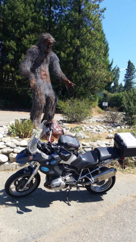 motorcycle and bigfoot statue