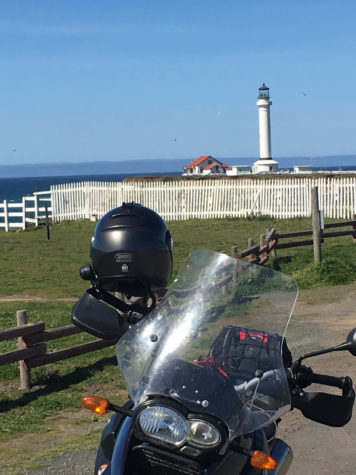 motorcycle and small lighthouse