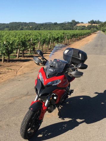 motorcycle by vineyard