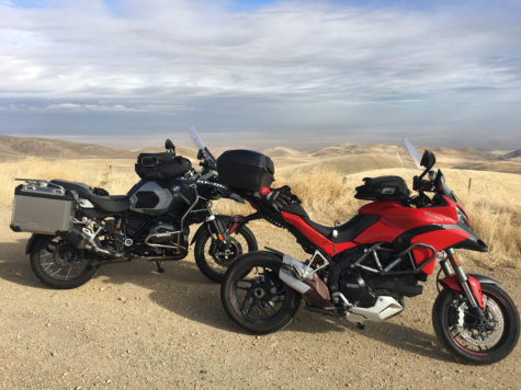 motorcycles with rolling hills